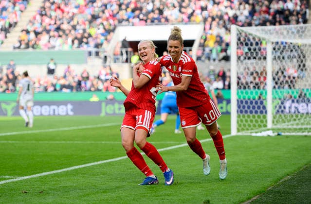 Cheering Pernille HARDER M after her goal to 0 2, with Linda DALLMANN r M DFB Pokal der Frauen Finale 2026, VfL Wolfsburg WOB FC Bayern Muenchen M 0 4, am 14 05 2026 in Koeln Germany DFB regulations prohibit any use of photographs as image sequences and or quasi video Â