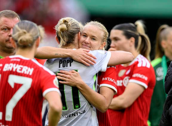 Pernille HARDER M hugs Alexandra POPP WOB after the match, consolation DFB Pokal der Frauen Finale 2026, VfL Wolfsburg WOB FC Bayern Muenchen M 0 4, am 14 05 2026 in Koeln Germany DFB regulations prohibit any use of photographs as image sequences and or quasi video Â