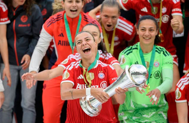 Award ceremony, cheering Arianna CARUSO M with the trophy DFB Pokal der Frauen Finale 2026, VfL Wolfsburg WOB FC Bayern Muenchen M 0 4, am 14 05 2026 in Koeln Germany DFB regulations prohibit any use of photographs as image sequences and or quasi video Â