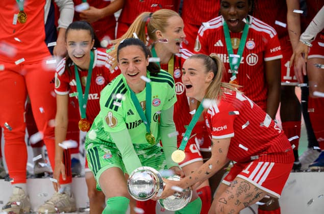 Award ceremony, cheering goalkeeper Maria Luisa GROHS M and Georgia STANWAY r M with the cup DFB Cup Womens Final 2026, VfL Wolfsburg WOB FC Bayern Muenchen M 0 4, on 14 05 2026 in Koeln Germany DFB regulations prohibit any use of photographs as image sequences and or quasi video Â