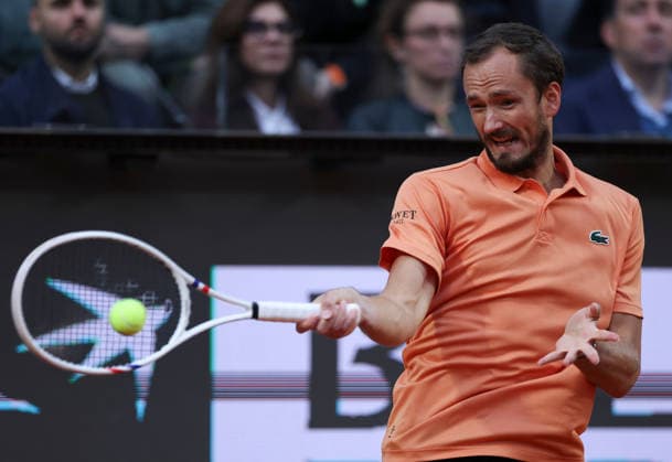 (260515) -- ROME, May 15, 2026 -- Daniil Medvedev of Russia hits a return during the men s singles quarterfinal match between Martin Landaluce of Spain and Daniil Medvedev of Russia at the ATP, Tennis Herren Italian Open in Rome, Italy, May 14, 2026. ) (SP)ITALY-ROME-TENNIS-ATP-MARTIN LANDALUCE VS DANIIL MEDVEDEV LixJing 