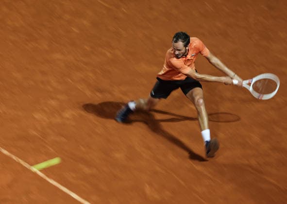 (260515) -- ROME, May 15, 2026 -- Daniil Medvedev of Russia hits a return during the men s singles quarterfinal match between Martin Landaluce of Spain and Daniil Medvedev of Russia at the ATP, Tennis Herren Italian Open in Rome, Italy, May 14, 2026. ) (SP)ITALY-ROME-TENNIS-ATP-MARTIN LANDALUCE VS DANIIL MEDVEDEV LixJing 