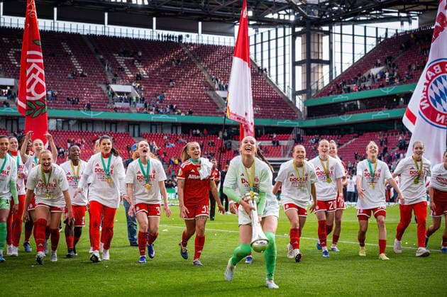 14 05 2026, xovx, Football, Women DFB Cup Final, VfL Wolfsburg FC Bayern Munich The players of FC Bayern Munich celebrate the double by winning the German Championship and the DFB Cup after the 4 0 victory over VfL Wolfsburg In front Ina Mahmutovic FC Bayern Munich with the cup Cologne Rhein Energie Stadium North Rhine-Westphalia Germany EN
