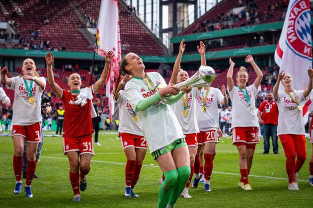 14 05 2026, xovx, Football, Women DFB Cup Final, VfL Wolfsburg FC Bayern Munich The players of FC Bayern Munich celebrate the double by winning the German Championship and the DFB Cup after the 4 0 victory over VfL Wolfsburg In front Ina Mahmutovic FC Bayern Munich with the cup Cologne Rhein Energie Stadium North Rhine-Westphalia Germany EN