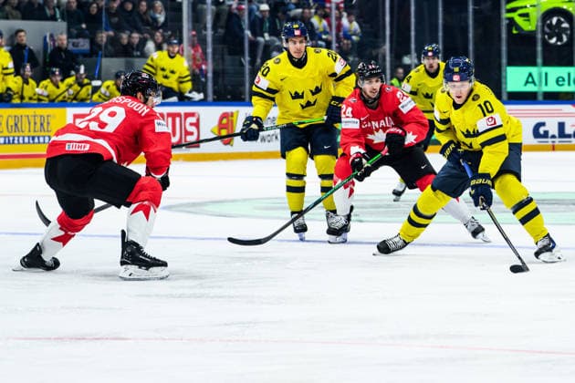 260515 Parker Wotherspoon and Dylan Cozens of Canada and Simon Holmström of Sweden during the 2026 IIHF Ice Hockey World Championship match between Canada and Sweden on May 15, 2026 in Fribourg Photo Jesper Zerman BILDBYRAN kod JZ JZ0714 ishockey ice hockey ishockey vm 2026 vm 2026 iihf world championship kanada canada sverige sweden bbeng  Copyright: JESPERxZERMAN BB260515BB167
