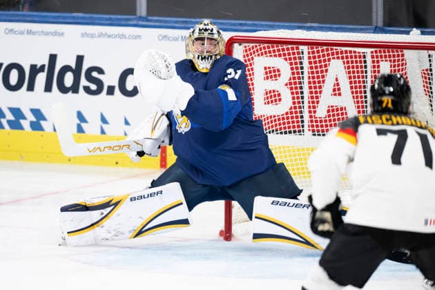 LKS 20260515 Finland s goalkeeper Justus Annunen during the 2026 IIHF Ice hockey, Eishockey World Championships preliminary round group A match between Finland and Germany in Zurich, Switzerland on May 15, 2026, right Germany s Daniel Fischbuch. - RONI REKOMAA Zürich Switzerland TR70IK4-1JM  Copyright: xRonixRekomaax TR70IK4-1JM