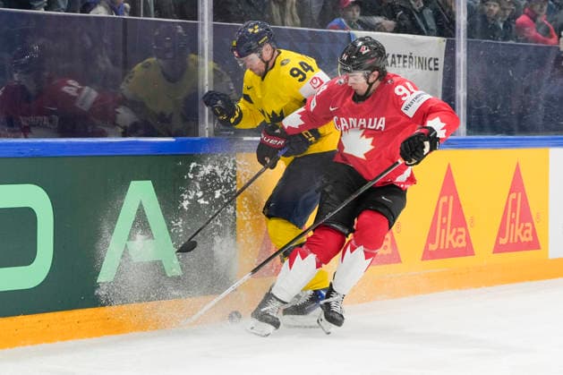 FRIBOURG, SWITZERLAND MAY 15 Joel Persson of Sweden L against John Tavares of Canada R during the 2026 IIHF Ice Hockey World Championship Switzerland game between Canada and Sweden at BCF Arena on May 15, 2026 in Fribourg, Fribourg Fribourg BCF Arena Fribourg Switzerland Copyright: xJustPictures.ch JarixPestelaccix jp-en-EuSpIm-JP6_JAR_Canada_Sweden_15May2026_00180