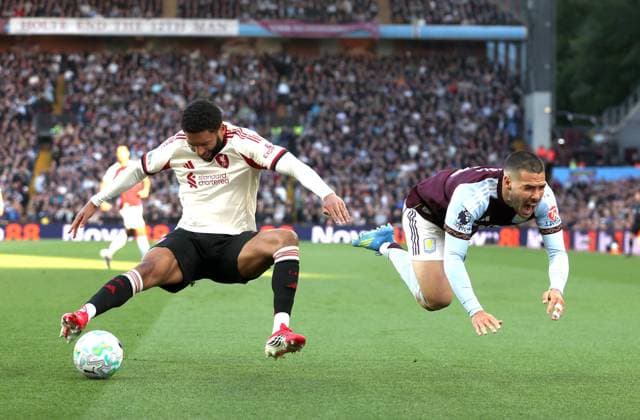 Joe Gomez of Liverpool fouls Emi Buendia of Aston Villa Aston Villa v Liverpool, Premier League, Football, Villa Park, Birmingham, UK - 15 May 2026Birmingham Villa Park United Kingdom EDITORIAL USE ONLY No use with unauthorised audio, video, data, fixture lists, club league logos or live services. Online in-match use limited to 120 images, no video emulation. No use in betting, games or single club league player publications.  Copyright: xKieranxMcManus Shutterstockx 16876814u
