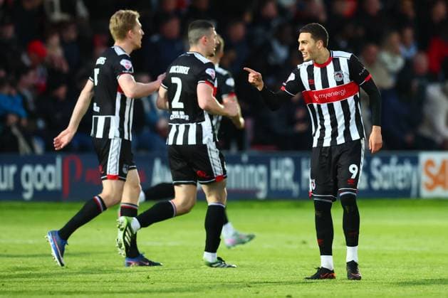 Jaze Kabia of Grimsby Town scores to make it 1-2 ad celebrates Salford City v Grimsby Town, EFL Sky Bet League Two, Play-Off Semi Final, Second Leg, Football, Peninsula Stadium, Salford, UK - 15 May 2026Salford Peninsula Stadium United Kingdom EDITORIAL USE ONLY No use with unauthorised audio, video, data, fixture lists, club league logos or live services. Online in-match use limited to 120 images, no video emulation. No use in betting, games or single club league player publications. Copyright: xPaulxCurrie Shutterstockx 16876823cn