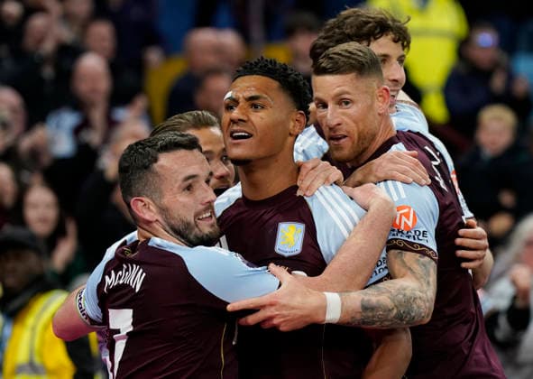 Birmingham, England, 15th May 2026. Ollie Watkins of Aston Villa celebrates after scoring the third goal during the Aston Villa vs Liverpool Premier League match at Villa Park, Birmingham. Picture credit should read: Andrew Yates Sportimage EDITORIAL USE ONLY. No use with unauthorised audio, video, data, fixture lists, club league logos or live services. Online in-match use limited to 120 images, no video emulation. No use in betting, games or single club league player publications. SPI_035_AY_ASTON_VILLA_LIVERPOOL SPI-4802-0034