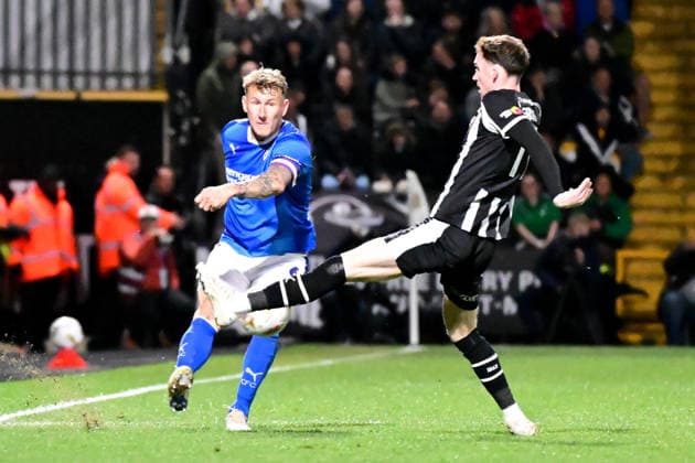 Notts County v Chesterfield, EFL Sky Bet League 2, Play Off Second Leg Chesterfield defender Kyle McFadzean (6) looks to release the ball under pressure from Notts County midfielder Conor Grant (11) during the EFL Sky Bet League 2 Play Off Second Leg match between Notts County and Chesterfield at Meadow Lane, Nottingham, UK on 15 May 2026. Nottingham Meadow Lane Nottinghamshire UK Editorial use only DataCo restrictions apply See www.football-dataco.com , Copyright: xDennisxGoodwinx PSI-24254-0056