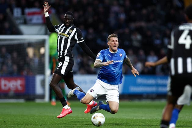 Nottingham, England, 15th May 2026. Kyle McFadzean of Chesterfield is fouled by Lee Ndlovu of Notts County during the Notts County vs Chesterfield Sky Bet League 2 match at Meadow Lane, Nottingham. Picture credit should read: Jake Youle Sportimage EDITORIAL USE ONLY. No use with unauthorised audio, video, data, fixture lists, club league logos or live services. Online in-match use limited to 120 images, no video emulation. No use in betting, games or single club league player publications. SPI_015_JY_Notts_County_Chesterfield SPI-4814-0015