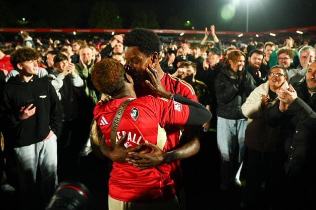 Kallum Cesay of Salford City celebrates at the end of the match with his mum Salford City v Grimsby Town, EFL Sky Bet League Two, Play-Off Semi Final, Second Leg, Football, Peninsula Stadium, Salford, UK - 15 May 2026Salford Peninsula Stadium United Kingdom EDITORIAL USE ONLY No use with unauthorised audio, video, data, fixture lists, club league logos or live services. Online in-match use limited to 120 images, no video emulation. No use in betting, games or single club league player publications. Copyright: xPaulxCurrie Shutterstockx 16876823cq