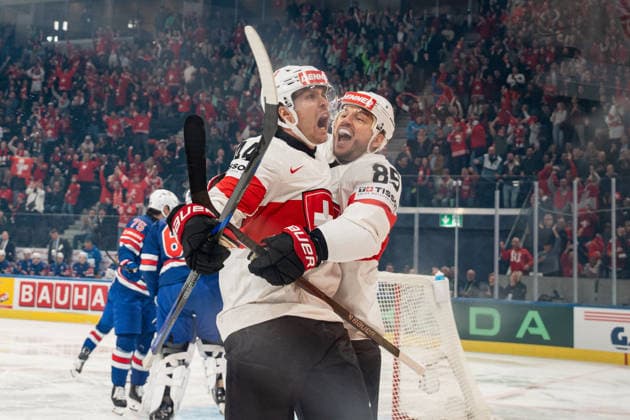 ZURICH, ZURICH - MAY 15: Pius Suter and Sven Andrighetto of Switzerland celebrate during the 2026 IIHF World Championship, WM, Weltmeisterschaft Group A match between Switzerland and USA at Swiss Life Arena on May 15, 2026 in Zurich, Zurich, Switzerland. Copyright: xLivioxBaeriswylx xSPPx Sportspressphoto_SPR147396
