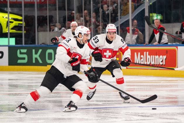 ZURICH, ZURICH - MAY 15: Nico Hischier and Theo Rochette of Switzerland during the 2026 IIHF World Championship, WM, Weltmeisterschaft Group A match between Switzerland and USA at Swiss Life Arena on May 15, 2026 in Zurich, Zurich, Switzerland. Copyright: xLivioxBaeriswylx xSPPx Sportspressphoto_SPR147436