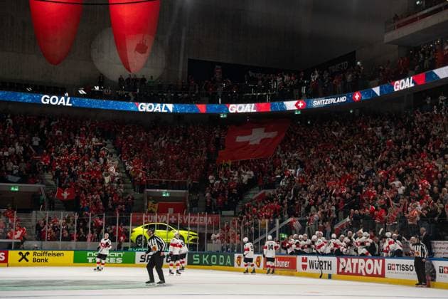 ZURICH, ZURICH - MAY 15: A large Switzerland flag is displayed across a section of the arena during the 2026 IIHF World Championship, WM, Weltmeisterschaft Group A match between Switzerland and USA at Swiss Life Arena on May 15, 2026 in Zurich, Zurich, Switzerland. Copyright: xLivioxBaeriswylx xSPPx Sportspressphoto_SPR147445