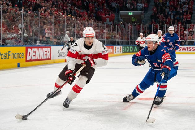 ZURICH, ZURICH - MAY 15: Ken Jäger of Switzerland battles with Ryan Ufko of USA during the 2026 IIHF World Championship, WM, Weltmeisterschaft Group A match between Switzerland and USA at Swiss Life Arena on May 15, 2026 in Zurich, Zurich, Switzerland. Copyright: xLivioxBaeriswylx xSPPx Sportspressphoto_SPR147448
