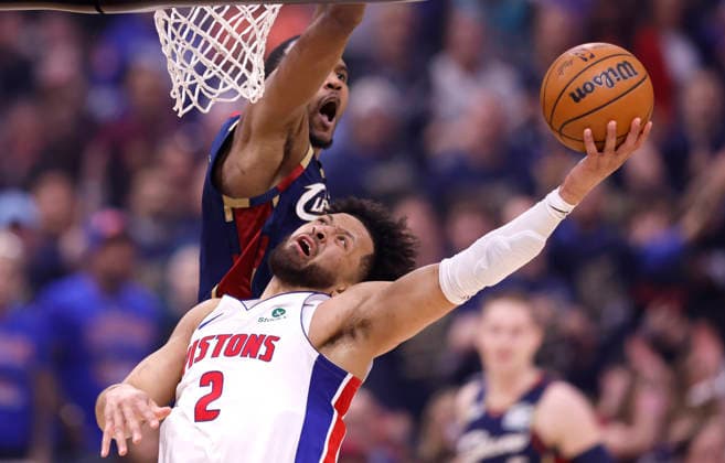 Detroit Pistons Cade Cunningham (2) puts up a shot while defended by Cleveland Cavaliers Evan Mobley (4) in the first quarter in Cleveland, Ohio Friday May 15, 2026.  CLE20260515105 AARONxJOSEFCZYK