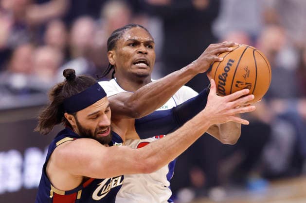 Detroit Pistons Ausar Thompson (9) battles Cleveland Cavaliers Max Strus (2) for a rebound in the first quarter in Cleveland, Ohio Friday May 15, 2026.  CLE20260515108 AARONxJOSEFCZYK