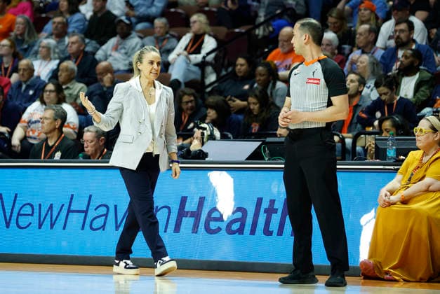 UNCASVILLE, CT - MAY 15: Becky Hammon of the Las Vegas Aces speaks with referee Isaac Barnett during the WNBA, Basketball Damen, USA game between Las Vegas Aces and Connecticut Sun on May 15, 2026, at Mohegan Sun Arena in Uncasville, CT. (Photo by M. Anthony Nesmith Icon Sportswire) WNBA: MAY 15 Las Vegas Aces at Connecticut Sun EDITORIAL USE ONLY Icon26051519