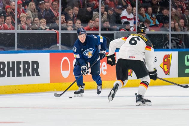 xxkeikkaxx 20260515 Swiss Life Arena, Zurich, Switzerland. IIHF Ice hockey, Eishockey World Championships match Finland vs Germany Jesse Puljujärvi (13) of Team Finland Kai Wissmann (6) of Team Germany Photo by Pasi Suokko All Over Press  1.06181488