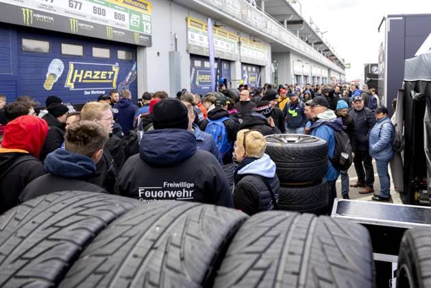 NÜRBURG - Race fans in the Nürburgring paddock. Max Verstappen is participating in the 24 Hours of Nürburgring together with his teammates Austrian Lucas Auer, Andorran Jules Gounon, and Spaniard Daniel Juncadella. SANDER KONING ANP xVIxANPxSportx xxANPxIVx 558430312 originalFilename: 558430312.jpg