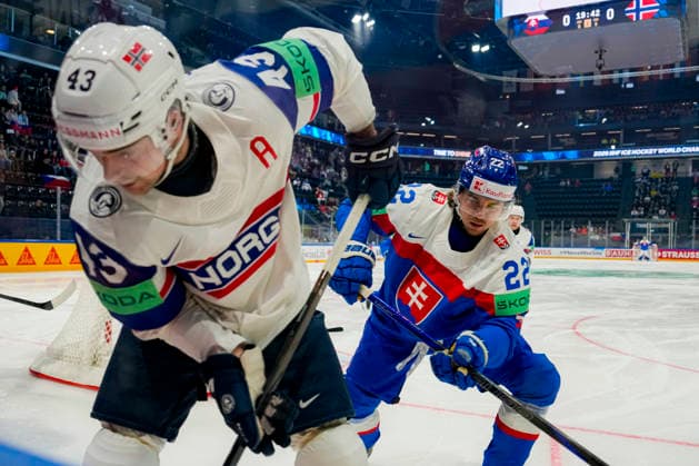 FRIBOURG, SWITZERLAND MAY 16 Kristian Pospisil of Slovakia R against Max Krogdahl of Norway L during the 2026 IIHF Ice Hockey World Championship Switzerland game between Slovakia and Norway at BCF Arena on May 16, 2026 in Fribourg, Fribourg Fribourg BCF Arena Fribourg Switzerland Copyright: xJustPictures.ch JarixPestelaccix jp-en-EuSpIm-JP6_JAR_Slovakia_Norway_16May2026_00001