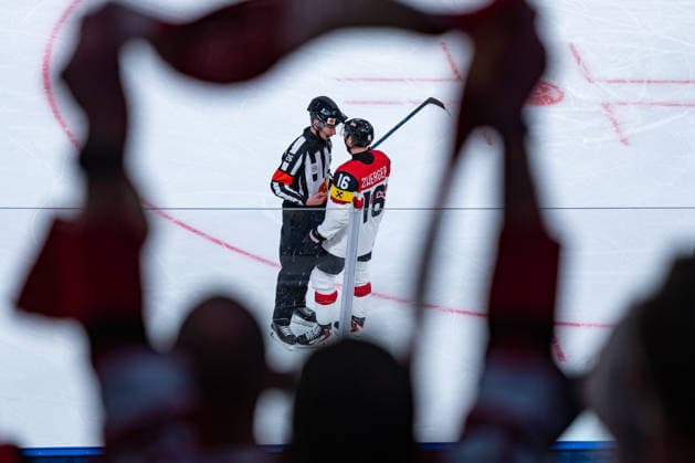 ZURICH, SWITZERLAND - MAY 16: Dominic Zweger (Austria, 16) and Christoffer Holm (Referee) during the Preliminary Round - Group A Match 5 between Great Britain and Austria at the IIHF Ice hockey, Eishockey World Championship, WM, Weltmeisterschaft 2026, Swiss Life Arena on May 16, 2026 in Zurich, Switzerland. Zurich Switzerland Copyright: xTimoxSteinx