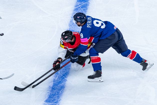 ZURICH, SWITZERLAND - MAY 16: Mario Huber (Austria, 96) in the battle for the puck with and Brett Perlini (Great Britain, 9) during the Preliminary Round - Group A Match 5 between Great Britain and Austria at the IIHF Ice hockey, Eishockey World Championship, WM, Weltmeisterschaft 2026, Swiss Life Arena on May 16, 2026 in Zurich, Switzerland. Zurich Switzerland Copyright: xTimoxSteinx