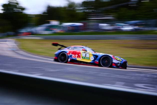 The Mercedes AMG GT3 with the starting number 3 of the Mercedes AMG Team Verstappen Racing drives through a curve on the Nürburgring The vehicle Daniel Juncadella Jules Gounon Lucas Auer Max Verstappen Mercedes AMG Team Verstappen Racing wears the striking Red Bull design in blue, red and yellow with RAVENOL and DEKRA sponsoring The panning shot underlines the high speed of the GT3 vehicle at the ADAC RAVENOL 24h Nürburgring 2026 Mercedes AMG GT3 3 by Verstappen Racing on the Nordschleife Copyright: xspeedshotx