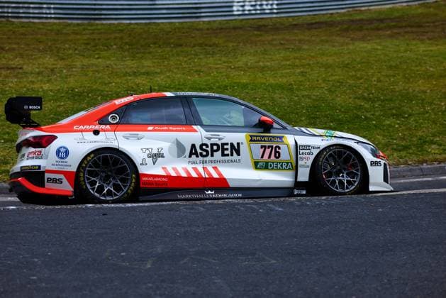 The Audi RS 3 LMS with starting number 776 of the sharky racing com team drives through a corner on the Nürburgring The white and red car Gian Maria Gabbiani Ivars Vallers Mikaela Ahlin Kottulinsky Philipp Eis sharky racing com bears the main sponsors ASPEN Fuel for Professionals and RAVENOL on the number plate and is equipped with Goodyear Eagle tires Other sponsors such as Bosch, PBS, Carrera and Markthalle Königshof adorn the body of sharky racing coms Audi RS 3 LMS 776 Audi sports car at the Nürburgring Copyright: xspeedshotx