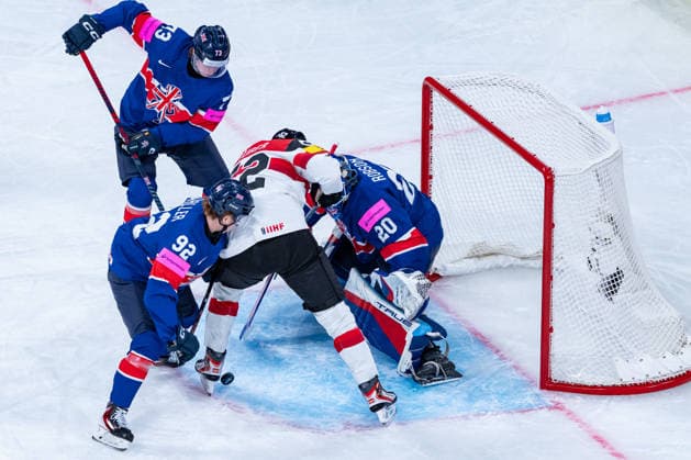 ZURICH, SWITZERLAND - MAY 16: Paul Huber (Austria, 52) in the battle for the puck with Mat Robson (Great Britain, 20), Joshua Waller (Great Britain, 92) and Joseph Hazeldine (Great Britain, 73) during the Preliminary Round - Group A Match 5 between Great Britain and Austria at the IIHF Ice hockey, Eishockey World Championship, WM, Weltmeisterschaft 2026, Swiss Life Arena on May 16, 2026 in Zurich, Switzerland. Zurich Switzerland Copyright: xTimoxSteinx