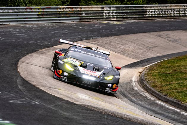 Red Bull Team ABT 84 SP 9 A Lamborghini Huracan GT3 Evo2 with black livery and sponsors such as Sonax, Red Bull and H R races on the Nürburgring circuit in Rhineland-Palatinate Germany
