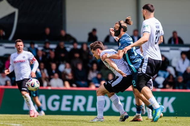 v l Martin Ens SC Verl, 05 , Sigurd Haugen TSV 1860 Muenchen, 22 , Oualid Mhamdi SC Verl, 20 GER, SC Verl vs TSV 1860 Muenchen, Football, 3 Liga, 38 Matchday, Season 2025 2026, 16 05 2026 DFL Regulations prohibit any use of photographers as image sequences and or quasi video GER, SC Verl vs TSV 1860 Muenchen, Football, 3 Liga, 38 Matchday, Season 2025 2026, 16 05 2026 Verl Copyright: xEibner-Pressefoto JanxRollingerx EP_JSK
