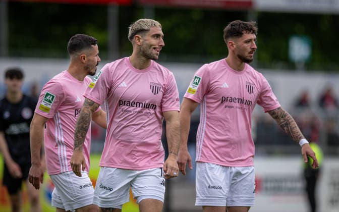 Soccer, Season 2025 2026, Regionalliga West, 16 05 2026, Matchday 34, Men, 1 FC Bocholt pink vs RW Oberhausen black restrained goal celebration v l Marvin Lorch 1 FC Bocholt , Marlon Frey 1 FC Bocholt , Cedric Euschen 1 FC Bocholt , Bocholt Stadion am Huenting Nordrhein Westfalen Germany 260516_fb_1fc-bocholt_rw-oberhausen_52221