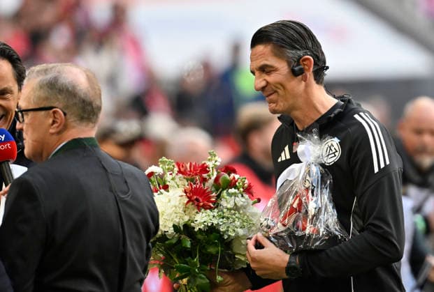 Emotion tears Referee Deniz Aytekin cries before his last Bundesliga match farewell flowers bouquet FC Bayern Muenchen FCB vs 1 FC Koeln 16 05 2026 DFL REGULATIONS PROHIBIT ANY USE OF PHOTOGRAPHS AS IMAGE SEQUENCES AND OR QUASI VIDEO FC Bayern Muenchen FCB vs 1 FC Koeln