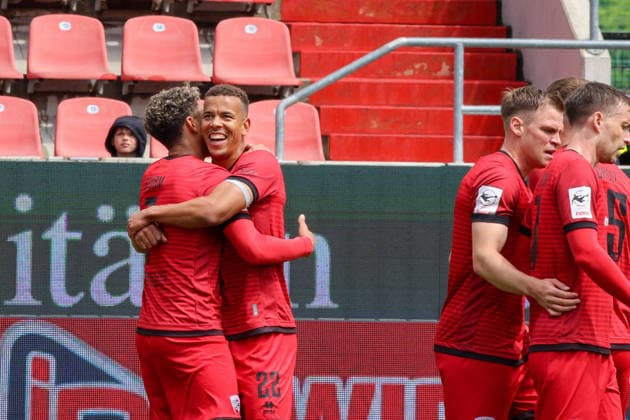 Marcel Costly FC Ingolstadt 04, No. 22 celebrates after scoring the 2-0 goal with Yann Sturm FC Ingolstadt 04, No. 7 at the match FC Ingolstadt 04 vs SV Waldhof Mannheim on 16 05 2026, DFB regulations prohibit any use of photographs as image sequences and or quasi video GER, Football, 3 Liga, Matchday 38, FC Ingolstadt 04 vs SV Waldhof Mannheim, 16 05 2026, Audi Sportpark Ingolstadt Copyright: xEibner-Pressefoto OliverxSTRISCHx EP-OSH