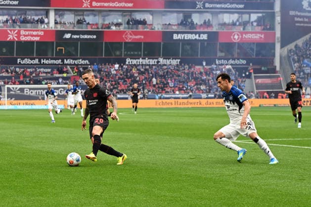 Alejandro Grimaldo Bayer 04 Leverkusen and Nicolas Capaldo Hamburger SV battle for the ball during the Bundesliga match between Bayer 04 Leverkusen and Hamburger SV, BayArena on May 16, 2026 in Leverkusen, Germany Photo by Ralf Treese DeFodi Images Alejandro Grimaldo Bayer 04 Leverkusen and Nicolas Capaldo Hamburger SV battle for the ball during the Bundesliga match between Bayer 04 Leverkusen and Hamburger SV at BayArena on May 16, 2026 in Leverkusen, Germany Photo by Ralf Treese DeFodi Images DFL regulations prohibit any use of photographs as image sequences and or quasi video Photo by Ralf Treese DeFodi Images