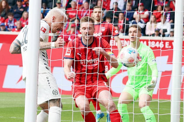 16 05 2026, xrekx, Soccer 1 Bundesliga, 1 FC Heidenheim FSV Mainz 05 v l header to 0 1 by Phillip Tietz 1 FSV Mainz 05 Patrick Mainka 1 FC Heidenheim 1846 Frank Feller 1 FC Heidenheim 1846 DFL DFB REGULATIONS PROHIBIT ANY USE OF PHOTOGRAPHS as IMAGE SEQUENCES and or QUASI VIDEO Heidenheim