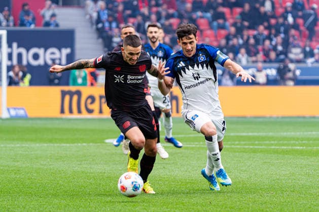Leverkusen, Germany 16 May 2026 1 BL 2025 2026 Sp 34 Bayer 04 Leverkusen v Hamburger SV Pictured from left in a duel Alejandro Grimaldo LEV and Nicolas Capaldo HSV DFL DFB regulations prohibit any use of photographs as image sequences and or quasi video BayArena Nordrhein Westfalen Copyright: xFotostandx xKruczynskix