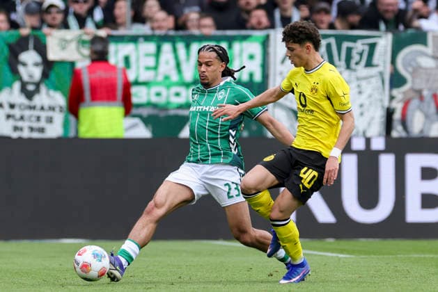 Isaac Schmidt Werder Bremen and Samuele Inacio Borussia Dortmund battle for the ball, Bundesliga, SV Werder Bremen v Borussia Dortmund, Weserstadion, May 16, 2026 in Bremen, Germany Photo by Marco Steinbrenner DeFodi Images Isaac Schmidt Werder Bremen and Samuele Inacio Borussia Dortmund battle for the ball, Bundesliga, SV Werder Bremen v Borussia Dortmund, Weserstadion, May 16, 2026 in Bremen, Germany Photo by Marco Steinbrenner DeFodi Images DFL regulations prohibit any use of photographs as image sequences and or quasi video