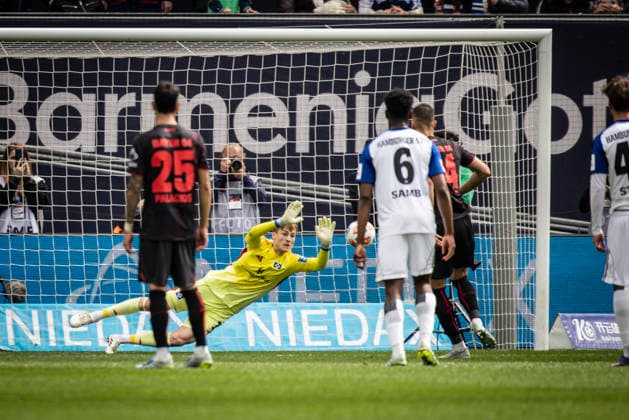 LEVERKUSEN, GERMANY - MAY 16, 2026 : Keeper Sander Tangvik (Hamburger SV, 12) saves the penalty against Patrik Schick (Bayer 04 Leverkusen, 14) during the German Bundesliga match on gameday 34 between Bayer 04 Leverkusen vs. Hamburger SV at BayArena on May 16, 2026 in Leverkusen, Germany. DFL REGULATIONS PROHIBIT ANY USE OF PHOTOGRAPHS AS IMAGE SEQUENCES AND OR QUASI-VIDEO. Northrhine-Westphalia Germany Copyright: xAxelxKohringx
