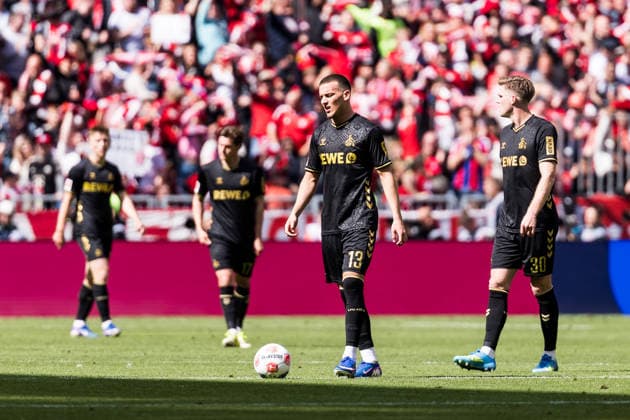 MUNICH, GERMANY - MAY 16: Said El Mala (1. FC Koeln, 13) and Marius Buelter (Bülter, Bulter, 1. FC Koeln, 30) frustrated during the Bundesliga match between FC Bayern Muenchen vs. 1. FC Koeln at Allianz Arena on matchday 34 of the 1. Bundesliga on May 16, 2026 in Munich, Germany. DFL REGULATIONS PROHIBIT ANY USE OF PHOTOGRAPHS AS IMAGE SEQUENCES AND OR QUASI-VIDEO. Bavaria Germany Copyright: xSteffiexWunderlx