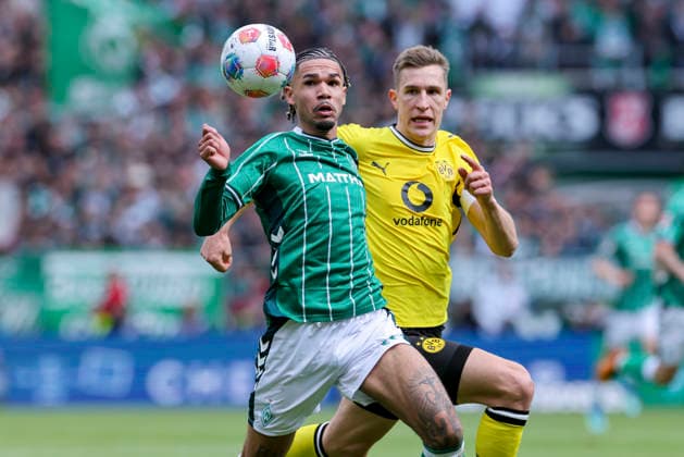 Justin Njinmah Werder Bremen and Nico Schlotterbeck Borussia Dortmund battle for the ball, Bundesliga, SV Werder Bremen v Borussia Dortmund, Weserstadion, May 16, 2026 in Bremen, Germany Photo by Marco Steinbrenner DeFodi Images Justin Njinmah Werder Bremen and Nico Schlotterbeck Borussia Dortmund battle for the ball, Bundesliga, SV Werder Bremen v Borussia Dortmund, Weserstadion, May 16, 2026 in Bremen, Germany Photo by Marco Steinbrenner DeFodi Images DFL regulations prohibit any use of photographs as image sequences and or quasi video