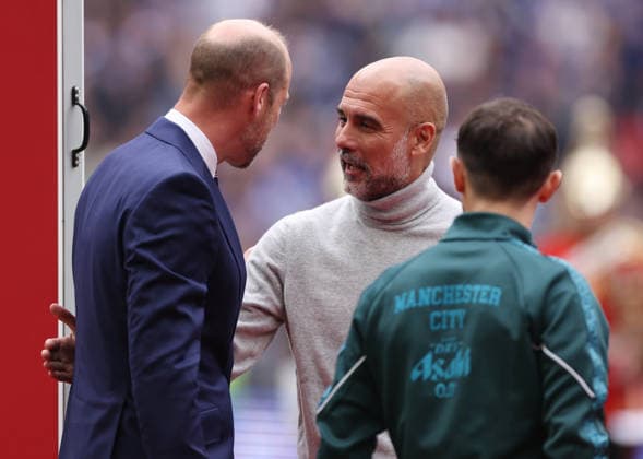 London, England, 16th May 2026. Prince William is introduced to Pep Guardiola coach of Manchester City during the Chelsea vs Manchester City FA Cup Final match at Wembley Stadium, London. Picture credit should read: David Klein Sportimage EDITORIAL USE ONLY. No use with unauthorised audio, video, data, fixture lists, club league logos or live services. Online in-match use limited to 120 images, no video emulation. No use in betting, games or single club league player publications. SPI_027_DK_Chelsea_Manchester_City SPI-4803-0027