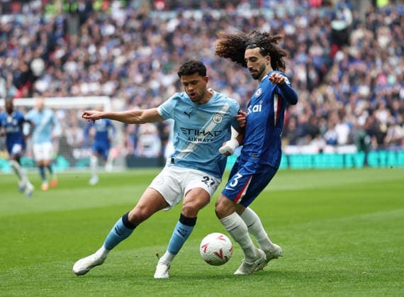 London, England, 16th May 2026. Matheus Nunes of Manchester City (l) tackles Marc Cucurella of Chelsea (r) during the Chelsea vs Manchester City FA Cup Final match at Wembley Stadium, London. Picture credit should read: David Klein Sportimage EDITORIAL USE ONLY. No use with unauthorised audio, video, data, fixture lists, club league logos or live services. Online in-match use limited to 120 images, no video emulation. No use in betting, games or single club league player publications. SPI_033_DK_Chelsea_Manchester_City SPI-4803-0033