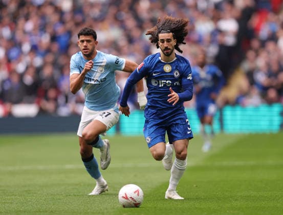 London, England, 16th May 2026. Marc Cucurella of Chelsea (r) chased by Matheus Nunes of Manchester City (l)during the Chelsea vs Manchester City FA Cup Final match at Wembley Stadium, London. Picture credit should read: David Klein Sportimage EDITORIAL USE ONLY. No use with unauthorised audio, video, data, fixture lists, club league logos or live services. Online in-match use limited to 120 images, no video emulation. No use in betting, games or single club league player publications. SPI_034_DK_Chelsea_Manchester_City SPI-4803-0034