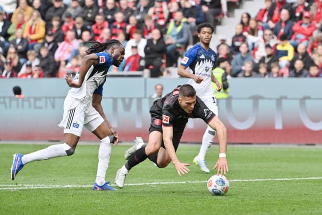 Penalty for Leverkusen, Jordan Torunarigha Hamburger SV brings Patrik Schick Bayer 04 Leverkusen , re , to fall 16 05 2026, Soccer 1 Bundesliga, Season 2025 2026, 34 Matchday, Bayer 04 Leverkusen Hamburger SV DFL regulations prohibit any use of photographs as image sequences and or quasi video Leverkusen BayArena Nordrhein Westfalen Germany Team2