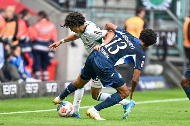 v li in duel Hugo Bolin Moenchengladbach 38 Bernardo Hoffenheim 13 16 05 2026 ¢ Football ¢ Borussia Moenchengladbach vs TSG Hoffenheim, Borussia Park, Moenchengladbach, DFB DFL REGULATIONS PROHIBIT ANY USE OF PHOTOGRAPHS AS IMAGE SEQUENCES AND OR QUASI VIDEO Copyright: xpepphotox xHorstxMauelshagenx pep00321, pep_20260516_hm_358328