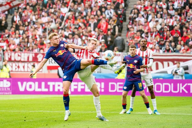 16 05 2026, xdaymx, Soccer 1 Bundesliga, SC Freiburg RB Leipzig vl Schandorff, Conrad Harder RB Leipzig in a tough duel with Matthias Ginter SC Freiburg DFL DFB REGULATIONS PROHIBIT ANY USE OF PHOTOGRAPHS as IMAGE SEQUENCES and or QUASI VIDEO Freiburg